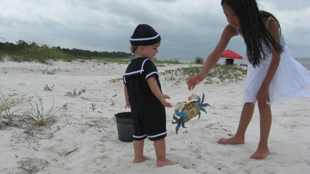 My grandson, Tristan, and niece, Madison, on a crabbing expedition. I've told them about playing with their food!