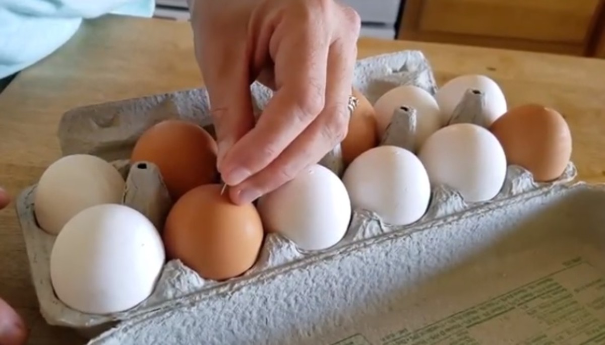 Before cooking the eggs, pierce the end of each one with a map tack in order to guarantee shell-free eggs