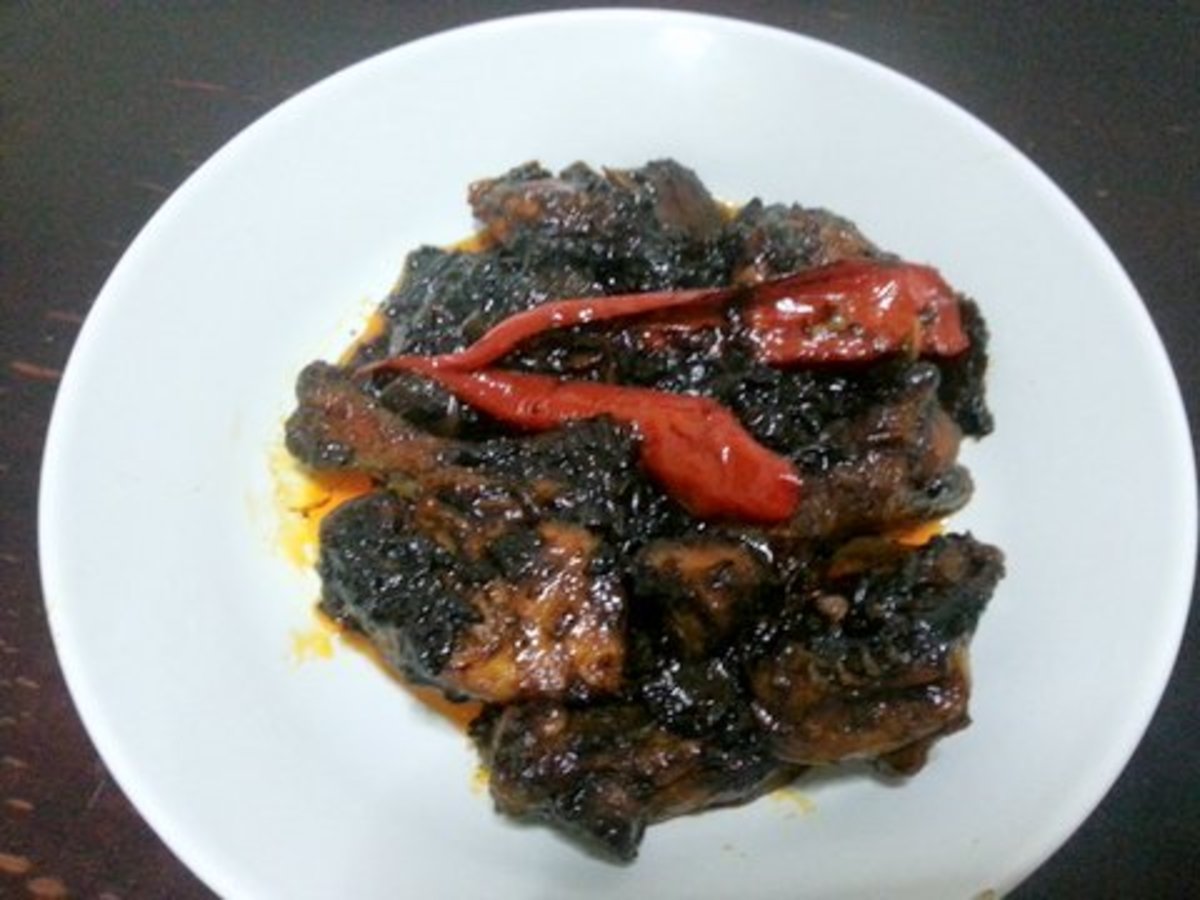 Ayam masak kicap pedas (spicy soy sauce chicken) ready to be served with steamed rice. Looks can be deceiving and this dish actually taste great!
