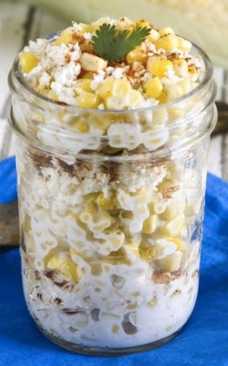 Mexican corn in a cup looks lovely when served in a clear glass jar.
